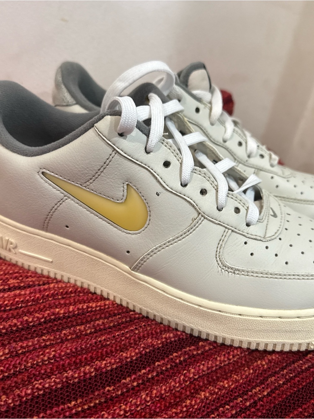 Nike White Leather Sneakers with Yellow Swoosh